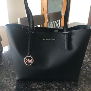 Gently used one season Michael kors bag